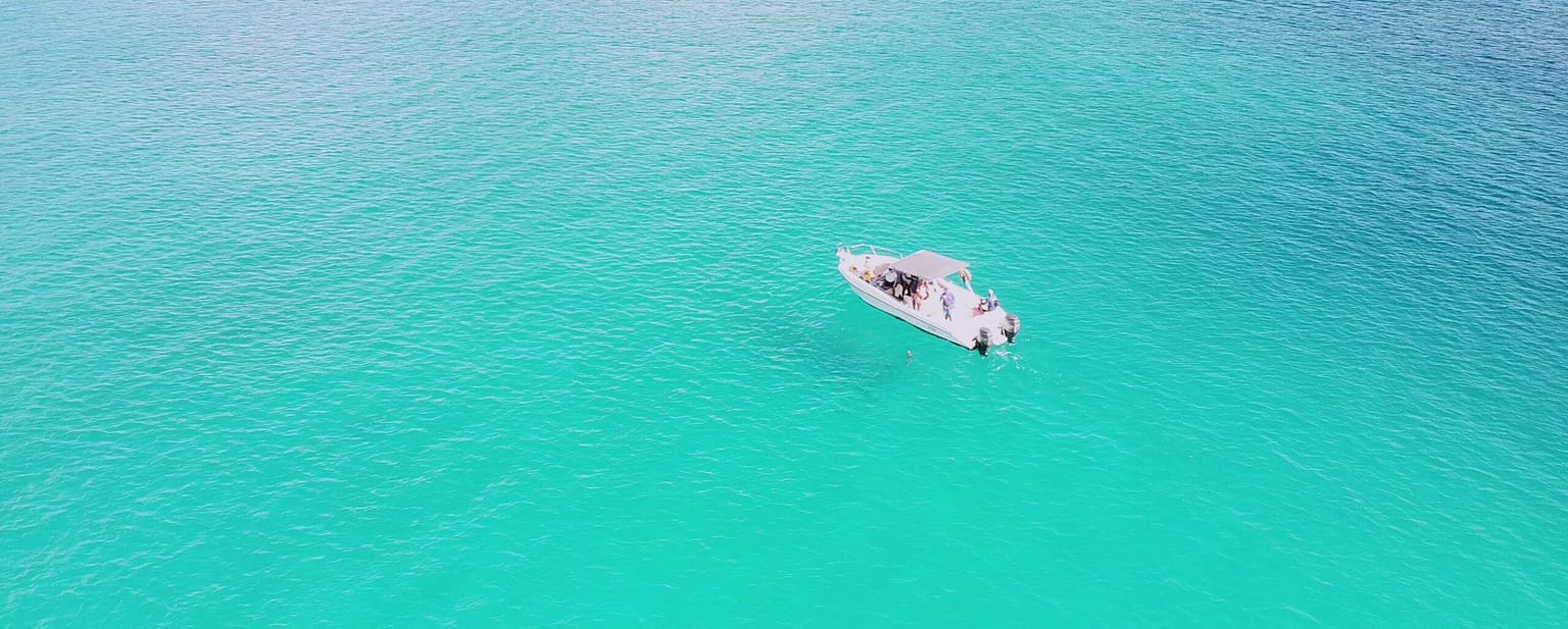 aerial shot of boat - about us